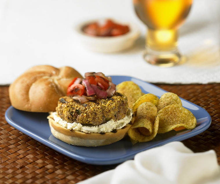 Mediterranean Australian lamb burger with goat cheese and tomato relish
