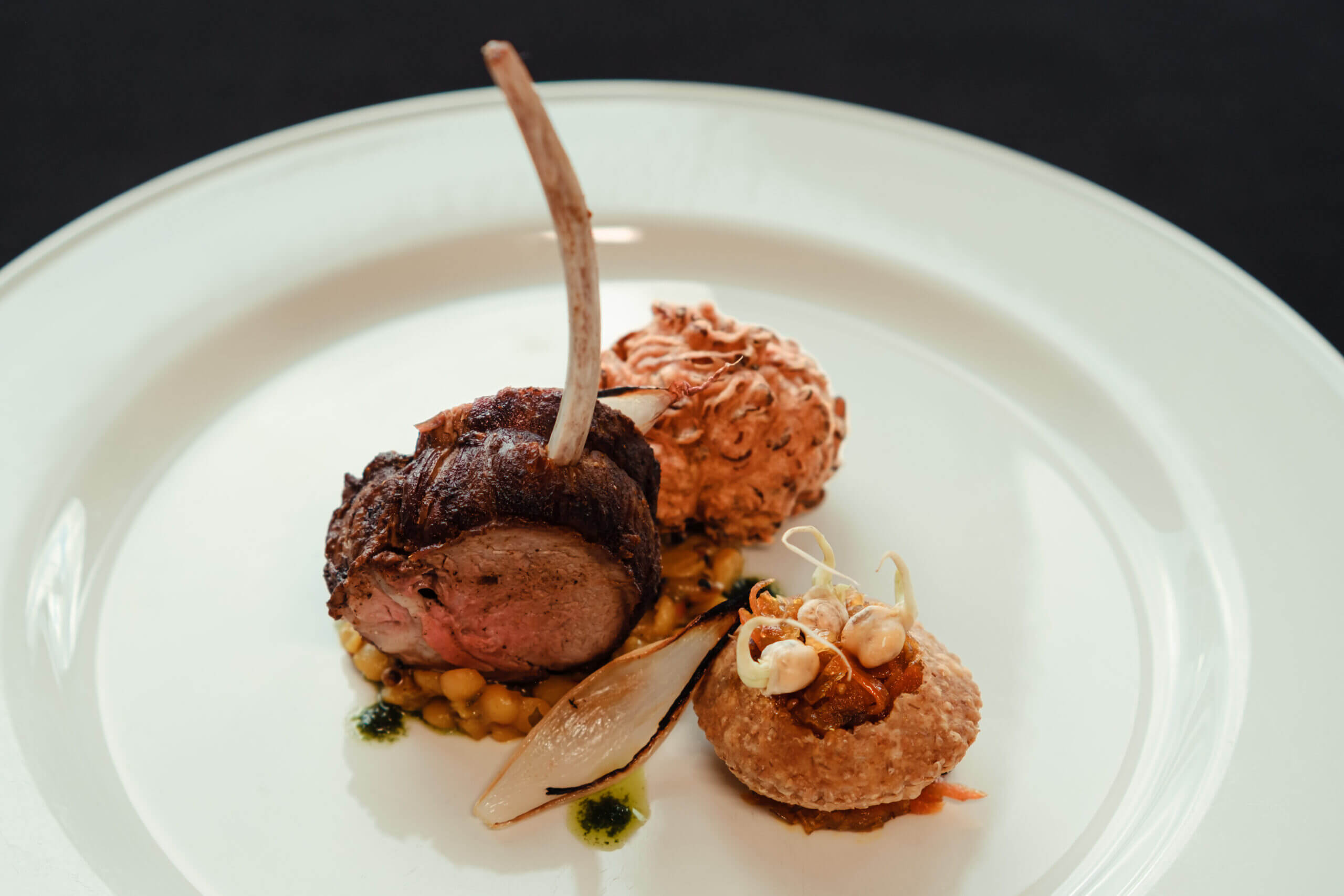 Aussie Lamb Rack, Split Pea Dhal, Onion Bhaji, Puri & Carrot Brinjal