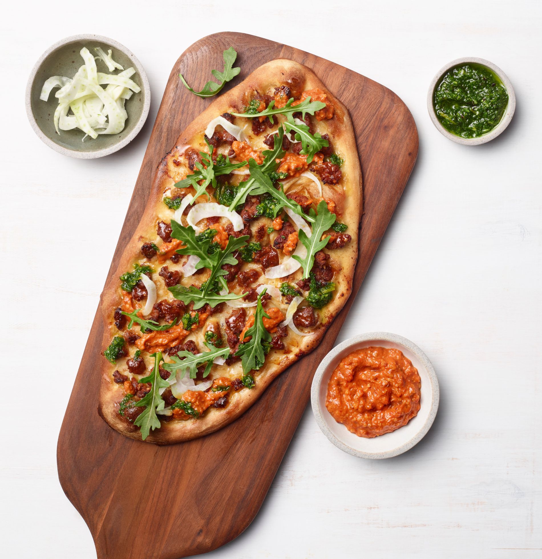 Aussie Lamb Pizza with Pickled Fennel, Hazelnut, Romesco + Gremolata