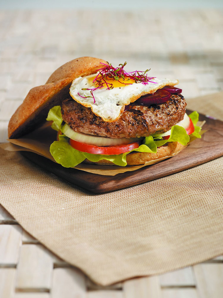 Lamb burger Aussie style with pickled beets and a fried egg