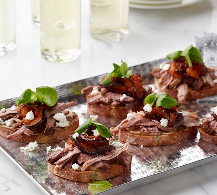 Black garlic aioli, braised eggplant, and lamb leg on bruschetta