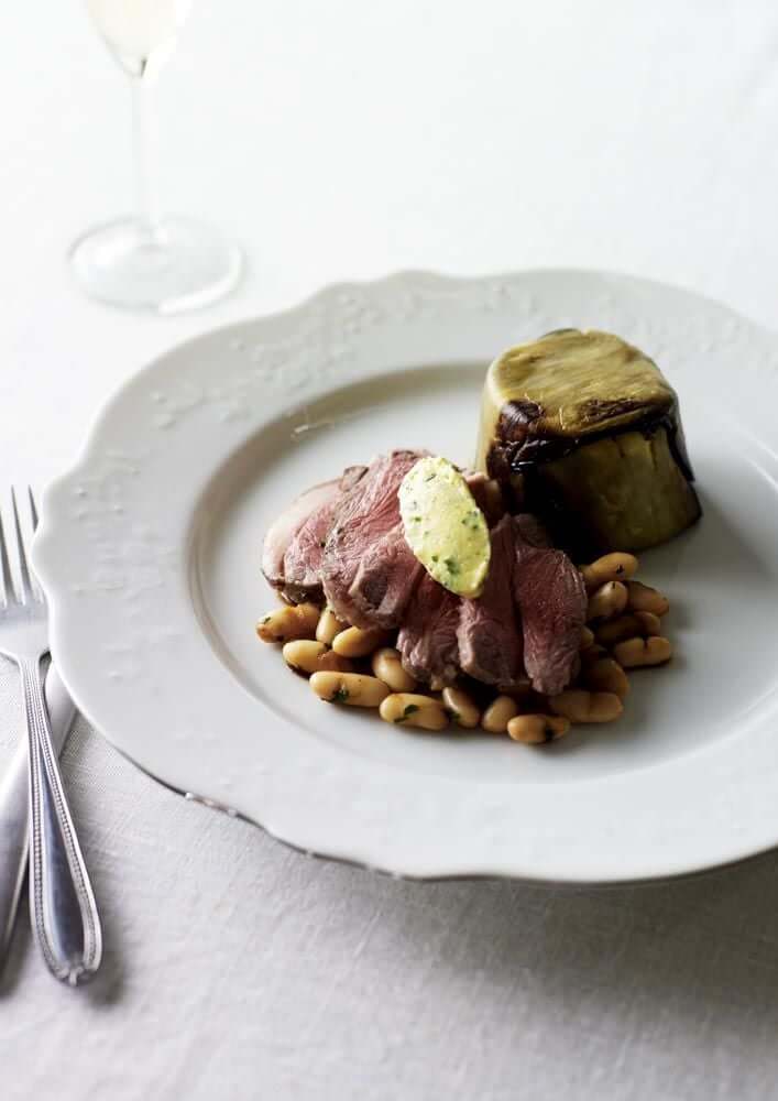 Roast lamb sirloin with flageolet beans and eggplant chartreuse