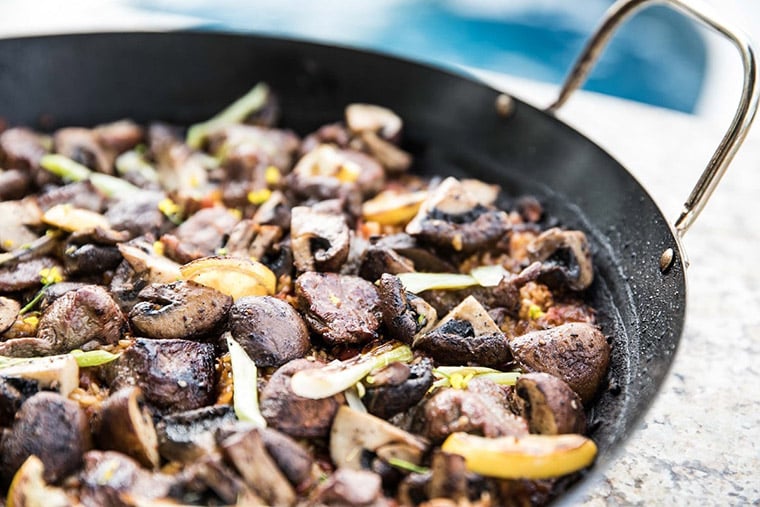 Roasted lamb shoulder paella with mushrooms, aleppo pepper and za'atar