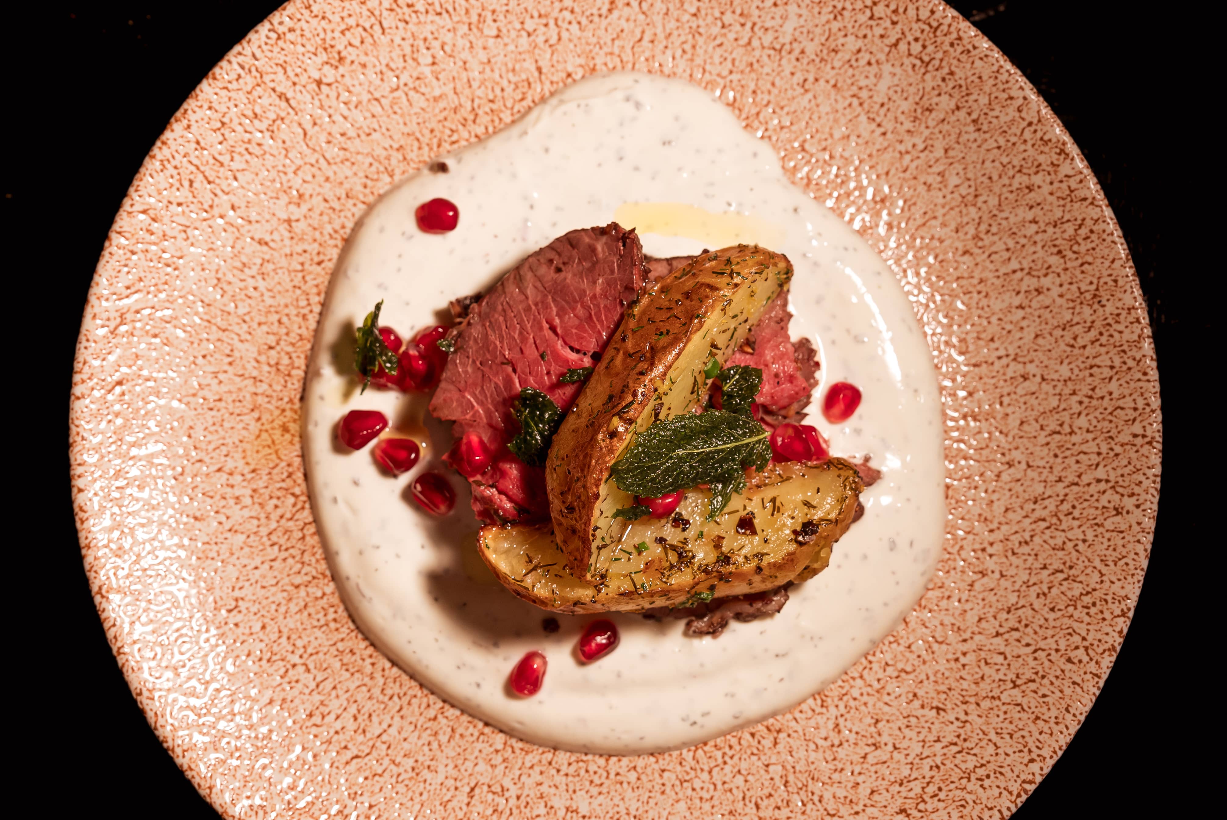 Pomegranate Braised Leg of Lamb with Lemon, Za’atar, Yogurt, Mint & Dill Potatoes